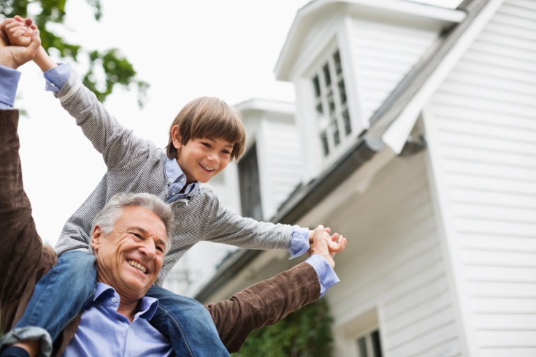 man-carrying-grandson