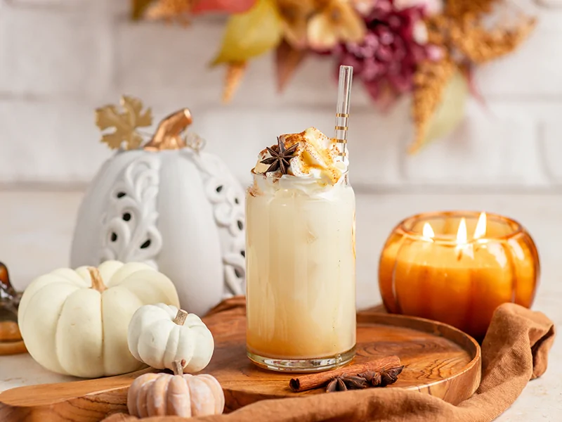 Enjoying a pumpkin spice latte on C-Street, one of the cozy fall things to do in Springfield MO during October nights