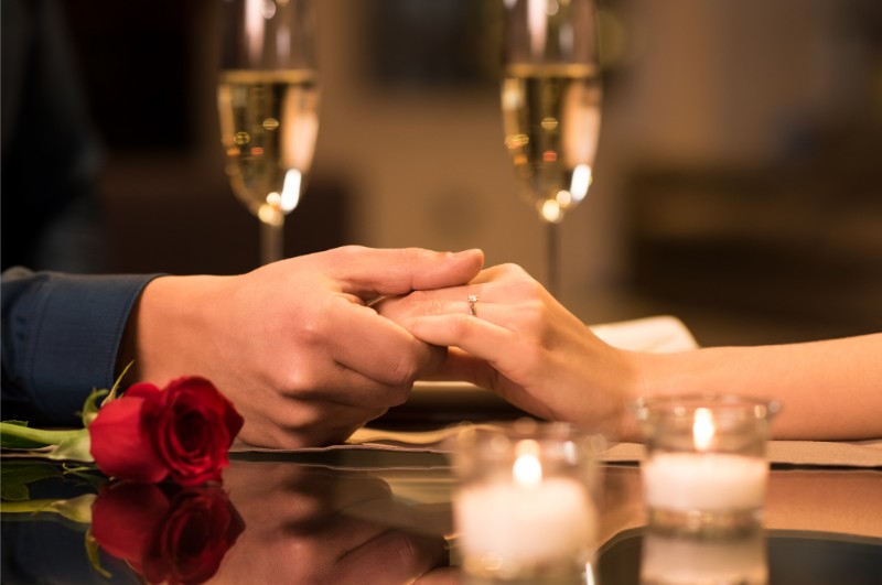 Couple holding hands