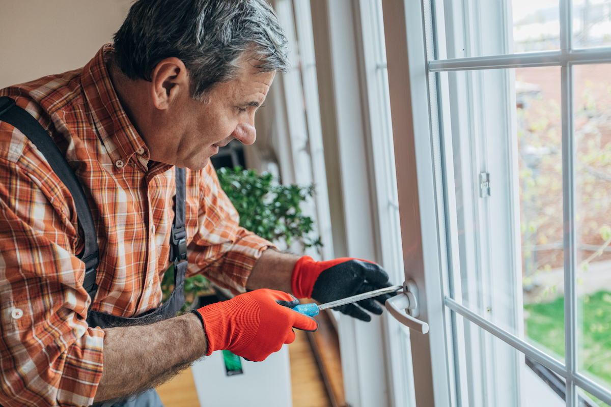 A worker installs windows